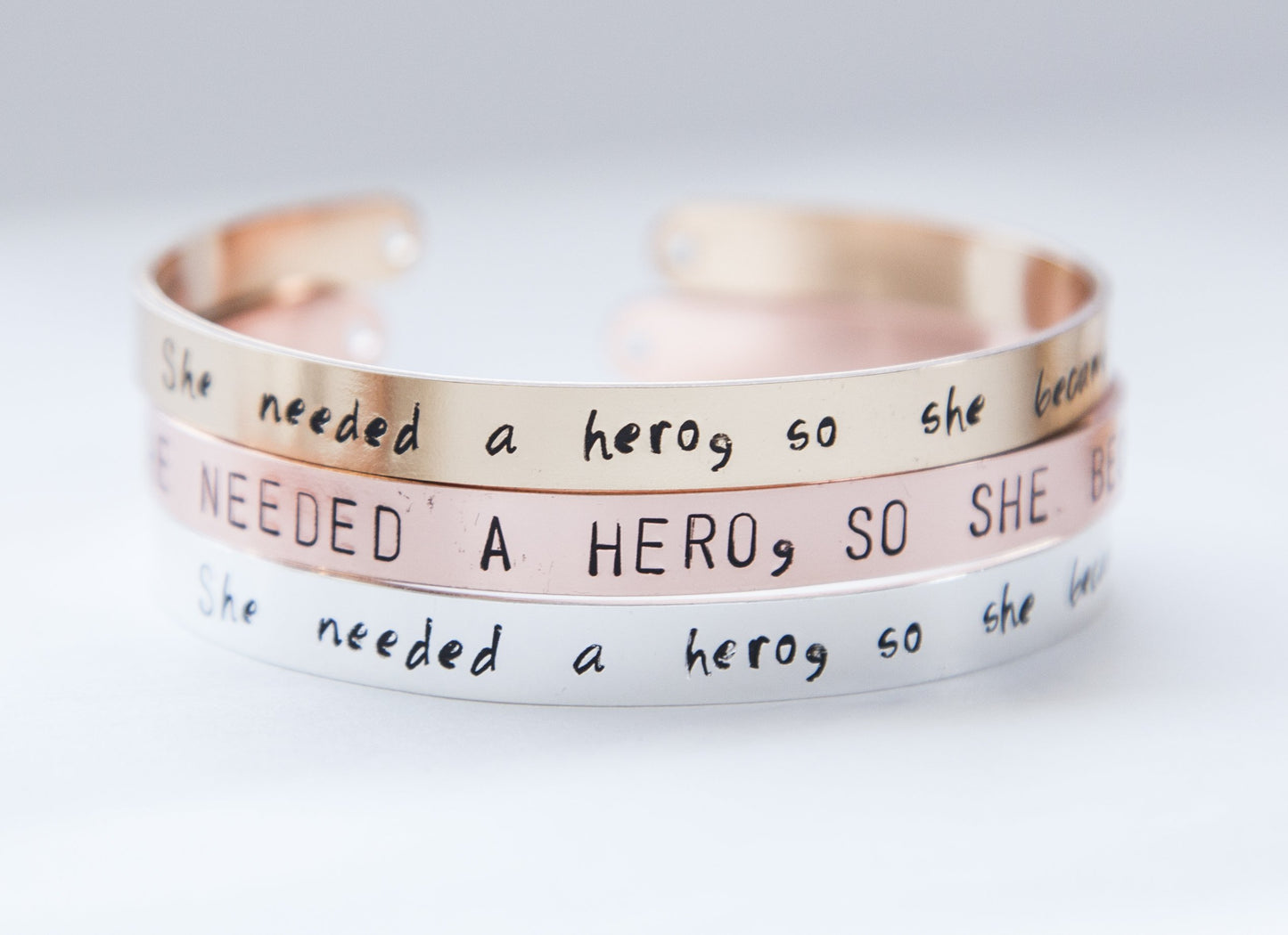 She needed a hero, so she became one, hand stamped cuff, silver/gold